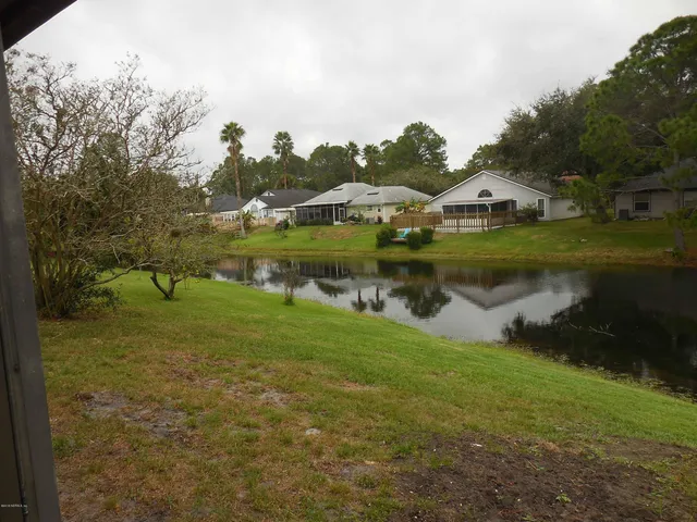 a view of a lake with houses