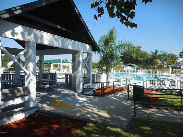 a view of a building with sitting area