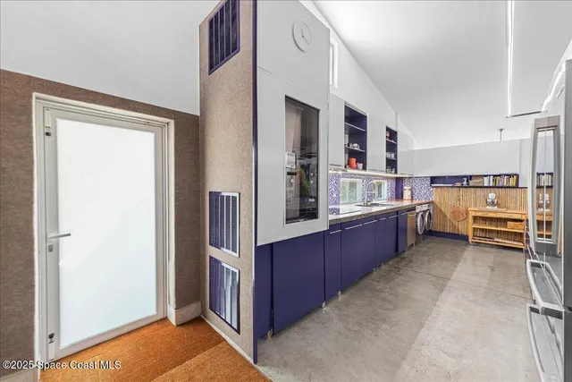 a view of a dining area with furniture window and outside view