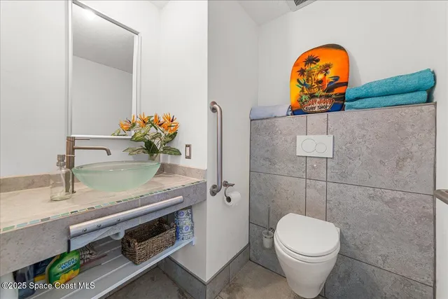 a spacious bedroom with a bed and a table in it