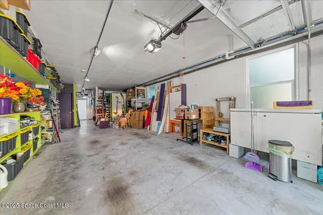 a view of a patio with table and chairs