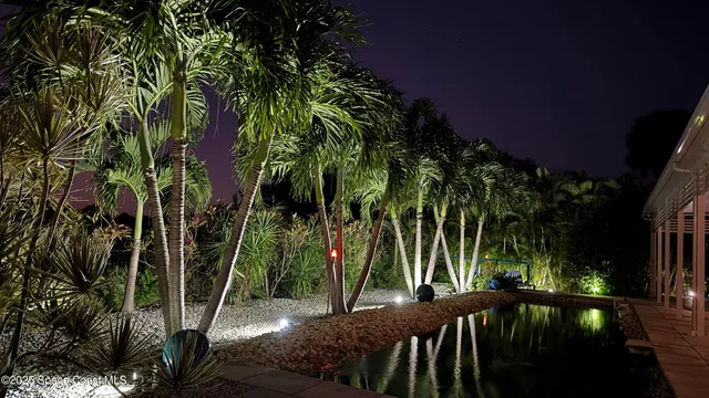 a view of a building with a yard