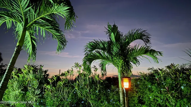 an aerial view of a house having yard