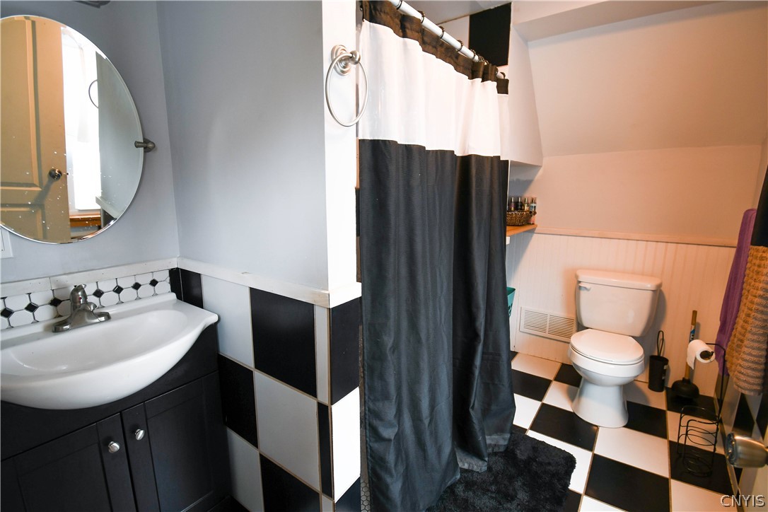 511 State Street Fulton, NY 13069 - Photo 24 of 35 Updated flooring in upstairs bathroom