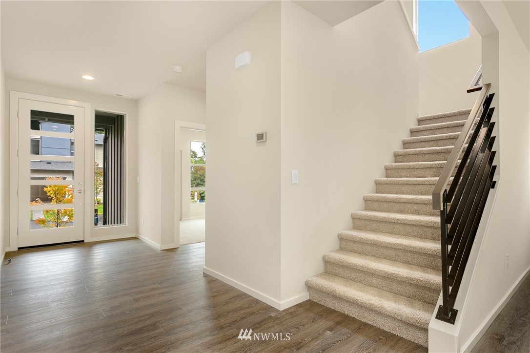 309 Southwest 3rd Court, Unit 9 Renton, WA 98057 - Photo 16 of 25 a view of an entryway with wooden floor