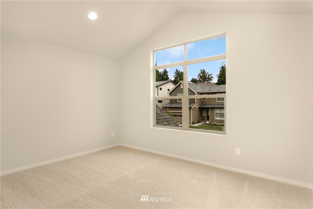 309 Southwest 3rd Court, Unit 9 Renton, WA 98057 - Photo 25 of 25 an empty room with a window