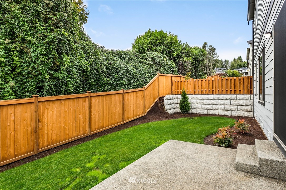 309 Southwest 3rd Court, Unit 9 Renton, WA 98057 - Photo 9 of 25 a view of backyard with wooden fence
