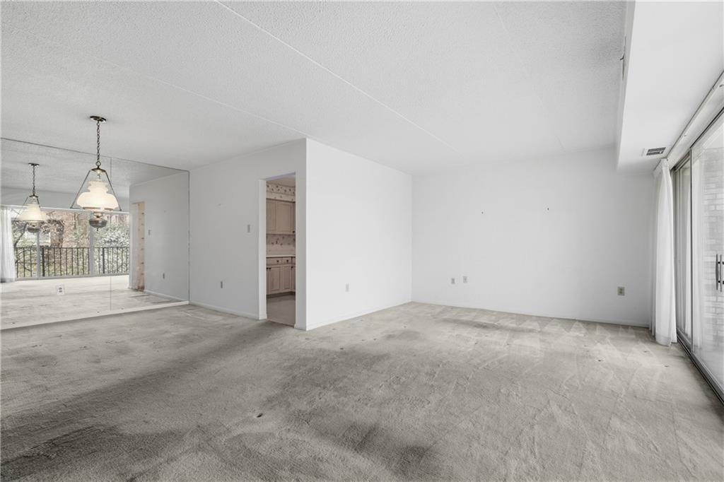 2160 Greentree Road, Unit 705W Pittsburgh, PA 15220 - Photo 8 of 32 an empty room with windows