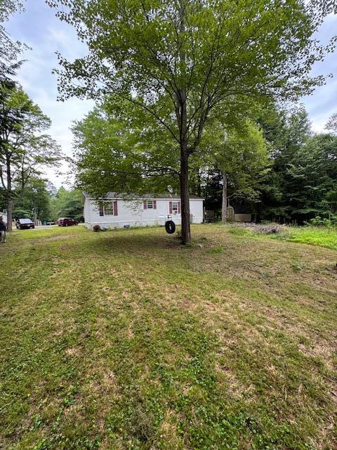 47 Fire Rd DC-1 Mount Vernon, ME 04352 - Photo 3 of 14 back yard mobile view