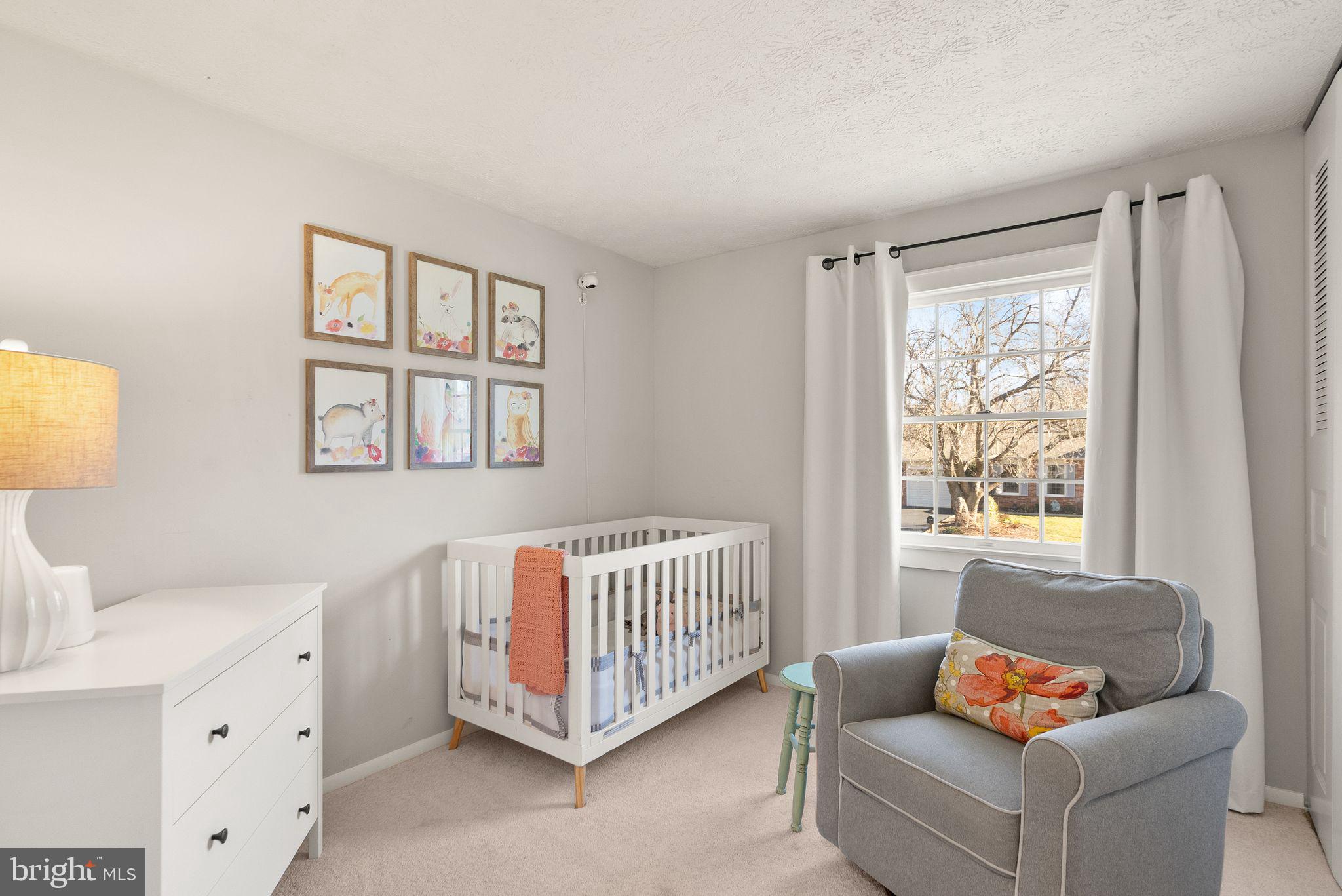 7902 Cliff Rock Court Springfield, VA 22153 - Photo 24 of 57 a living room with furniture and a window