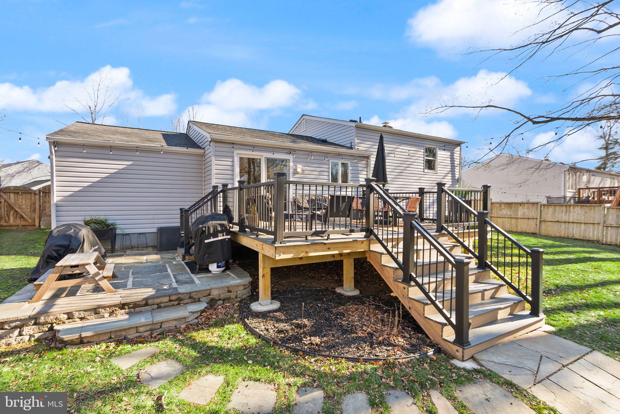 7902 Cliff Rock Court Springfield, VA 22153 - Photo 39 of 57 a view of a house with backyard and sitting area