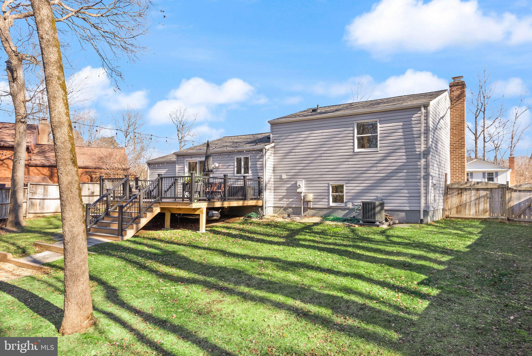 7902 Cliff Rock Court Springfield, VA 22153 - Photo 49 of 57 a view of a house with backyard porch and sitting area
