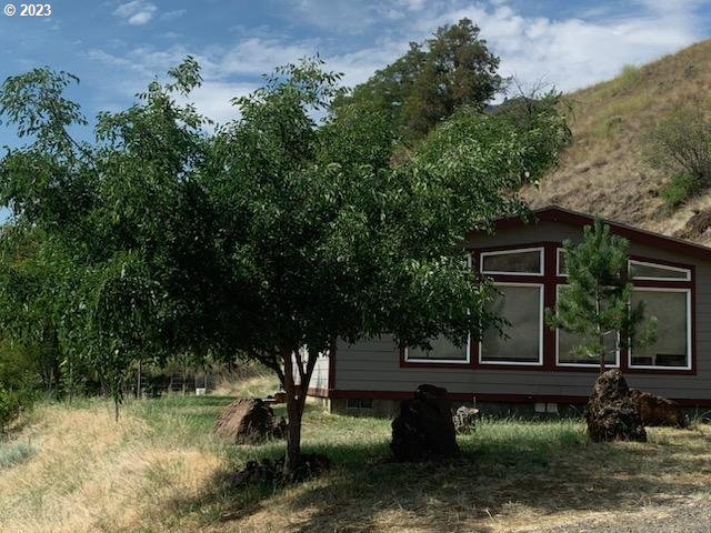 74234 Lower Imnaha Road Imnaha, OR 97842 - Photo 21 of 33 a view of a garden with a bench