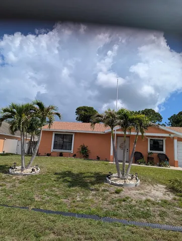 a front view of house with yard
