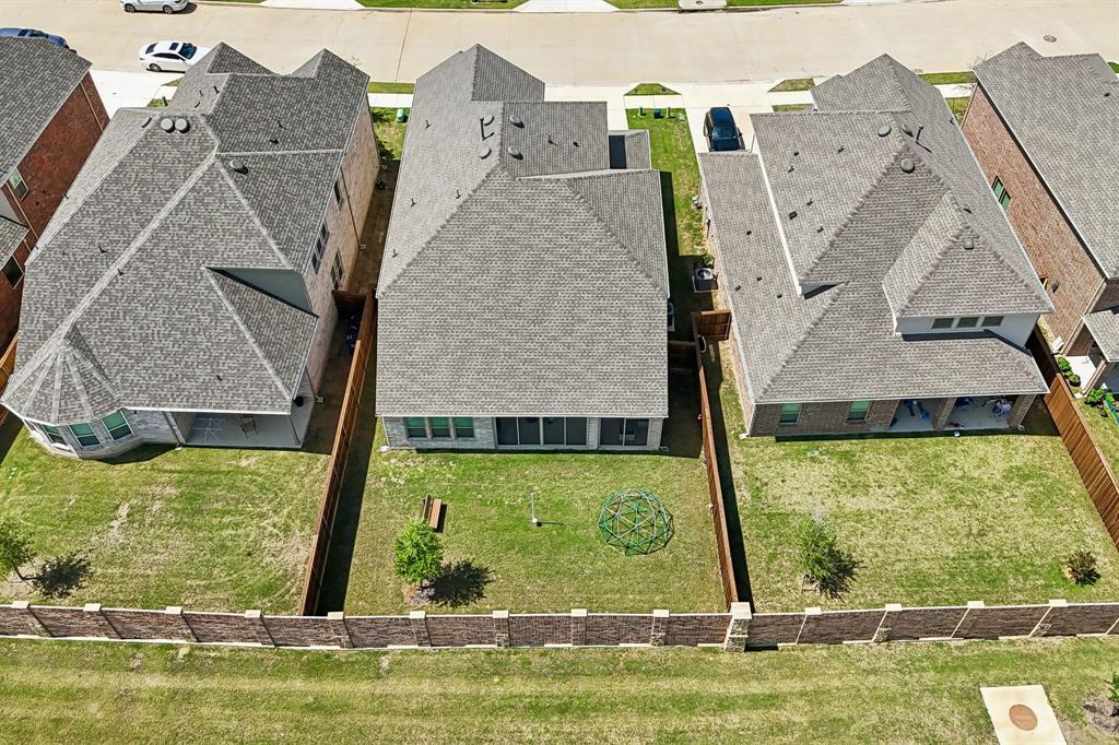 425 Breeds Hl Road Little Elm, TX 75068 - Photo 37 of 38 an aerial view of a house with a swimming pool