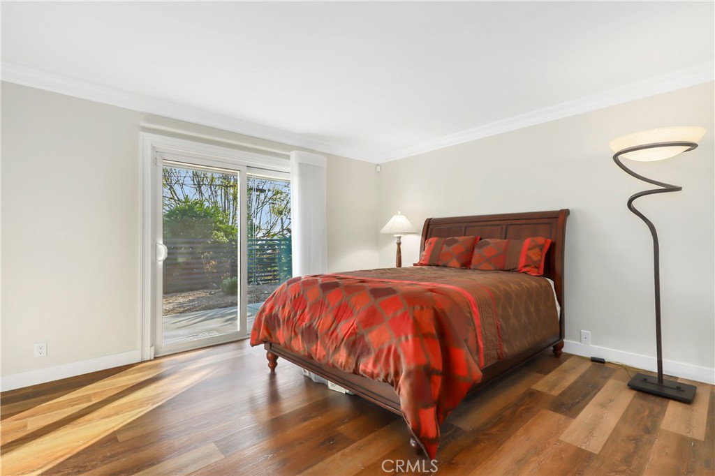 3810 Startouch Drive Pasadena, CA 91107 - Photo 25 of 53 a bedroom with a bed and wooden floor