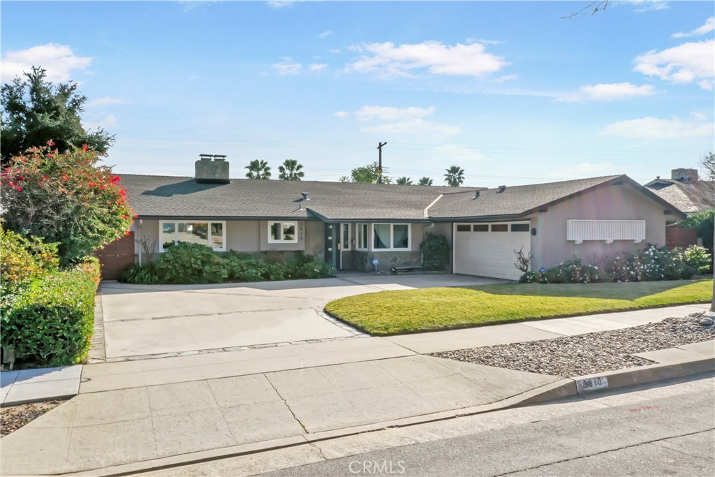 3810 Startouch Drive Pasadena, CA 91107 - Photo 5 of 53 a front view of a house with a yard and garage