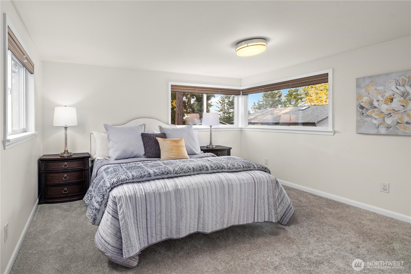 15245 Fremont Avenue North Shoreline, WA 98133 - Photo 14 of 28 a bedroom with a bed and a window