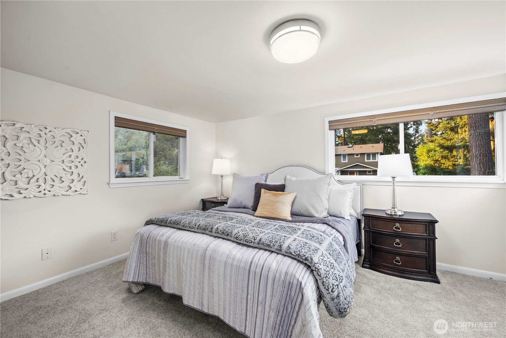 15245 Fremont Avenue North Shoreline, WA 98133 - Photo 15 of 28 a bedroom with a bed dresser and a window