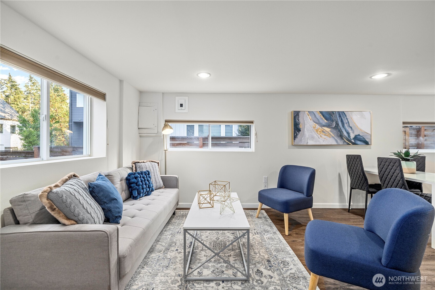 15245 Fremont Avenue North Shoreline, WA 98133 - Photo 17 of 28 a living room with furniture and a large window