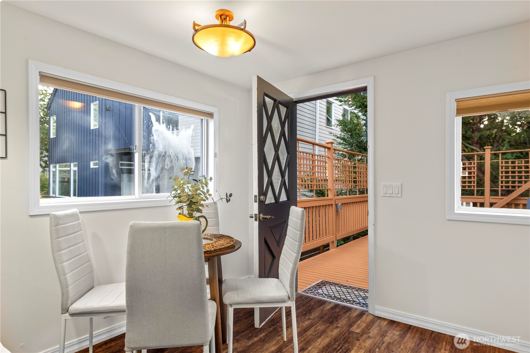 15245 Fremont Avenue North Shoreline, WA 98133 - Photo 10 of 28 a dining room with furniture window and wooden floor