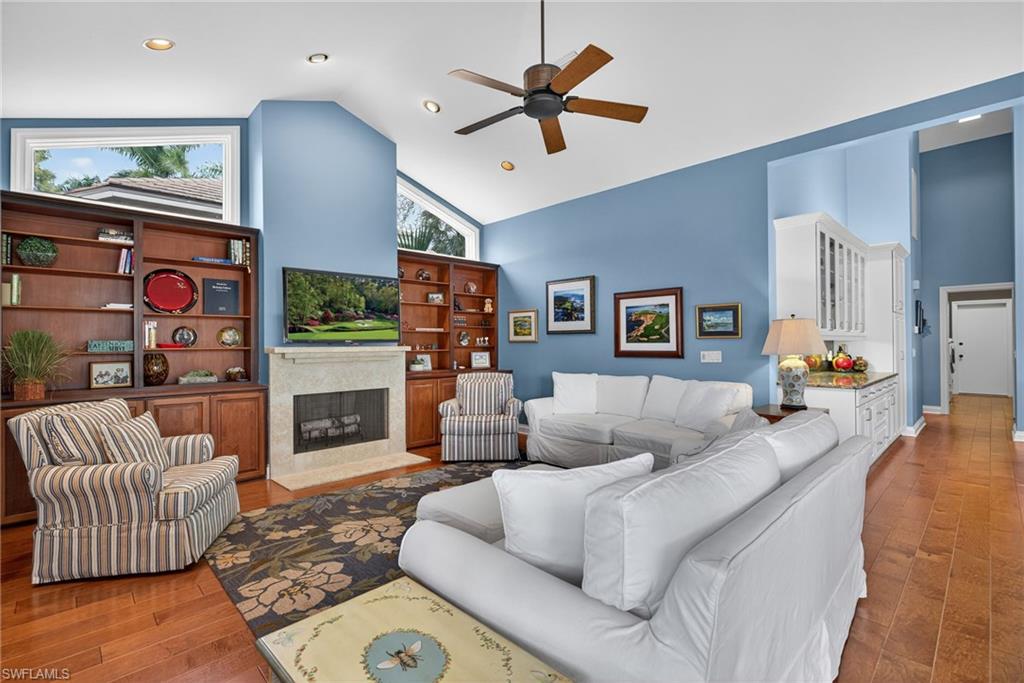 6 Bramblewood Point Naples, FL 34105 - Photo 19 of 47 a living room with furniture and a wooden floor