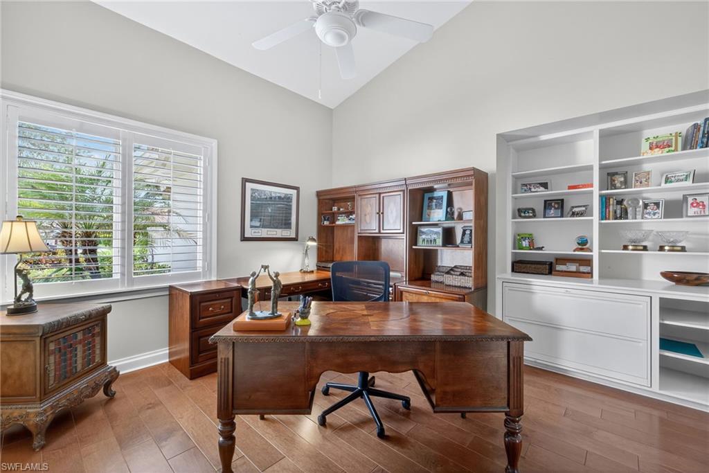 6 Bramblewood Point Naples, FL 34105 - Photo 28 of 47 a view of a workspace with furniture and a window