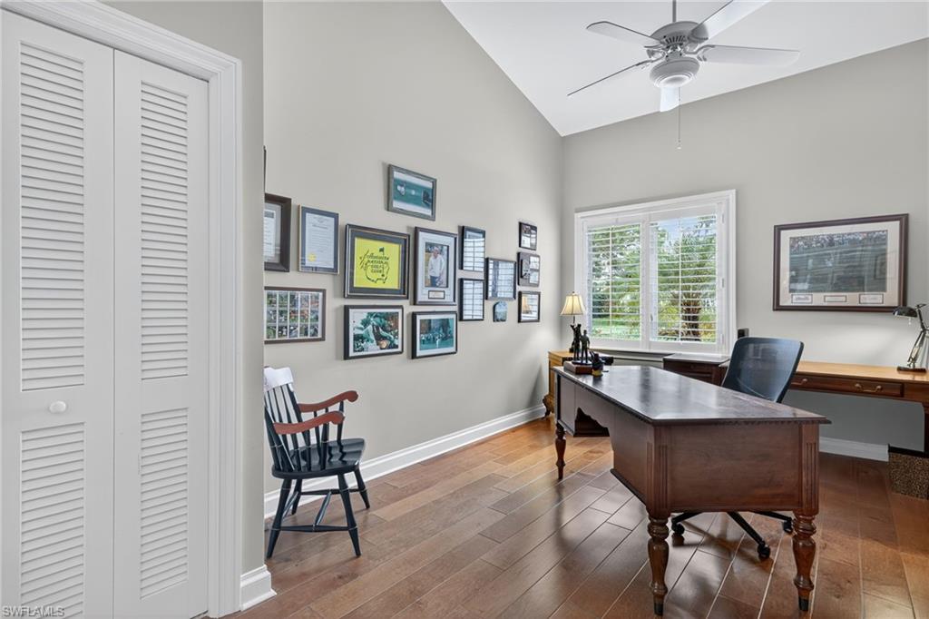 6 Bramblewood Point Naples, FL 34105 - Photo 29 of 47 a living room with furniture and a potted plant
