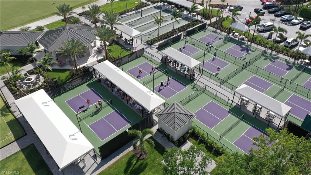 6 Bramblewood Point Naples, FL 34105 - Photo 42 of 47 an aerial view of a house with a yard