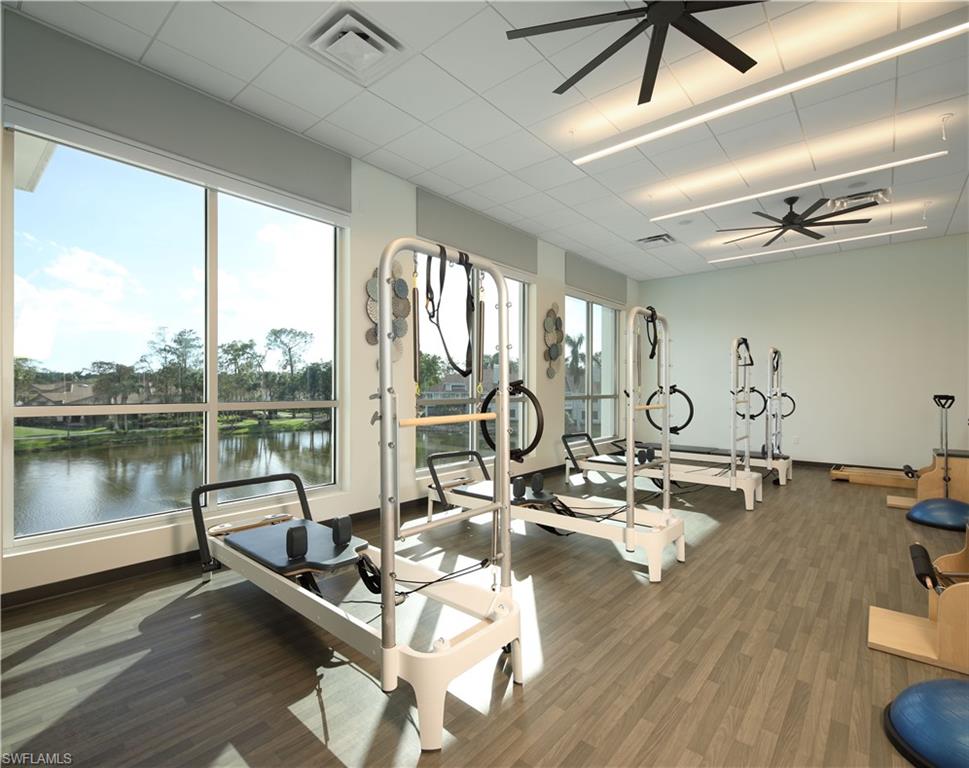 6 Bramblewood Point Naples, FL 34105 - Photo 44 of 47 a view of a room with gym equipment