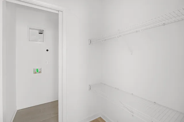 a view of swimming pool with an outdoor seating