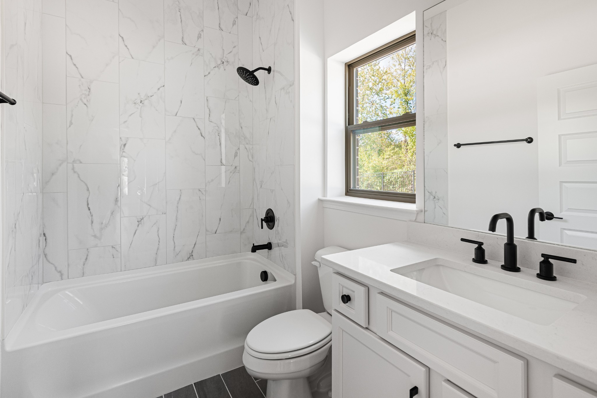 361 A Wellows Chase Spring Hill, TN 37174 - Photo 4 of 25 a bathroom with a sink a toilet and a bathtub