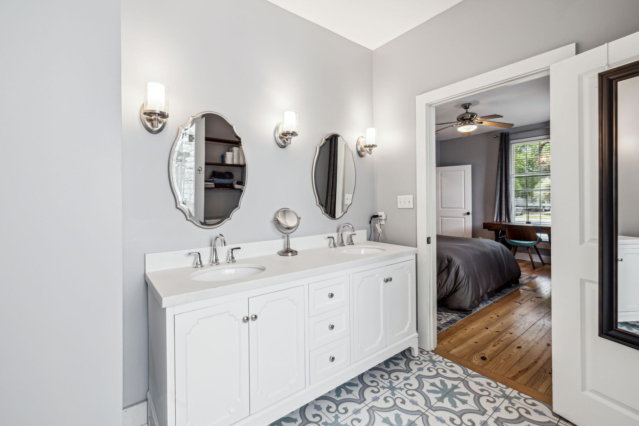 214 Chrysler Avenue Santa Rosa Beach, FL 32459 - Photo 22 of 53 a en suite bathroom with double vanity sinks and a mirror