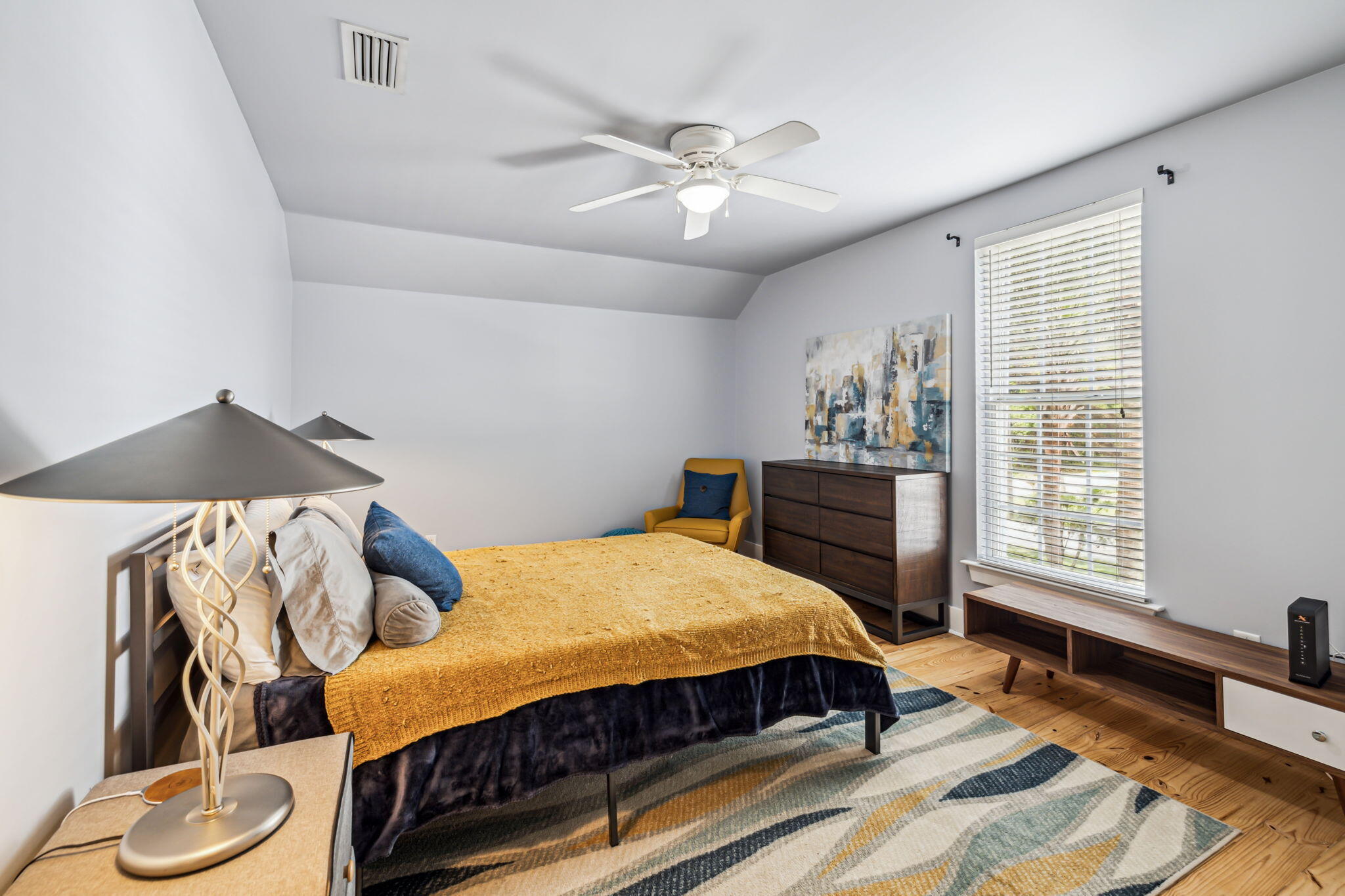 214 Chrysler Avenue Santa Rosa Beach, FL 32459 - Photo 24 of 53 a bedroom with a bed and a chandelier