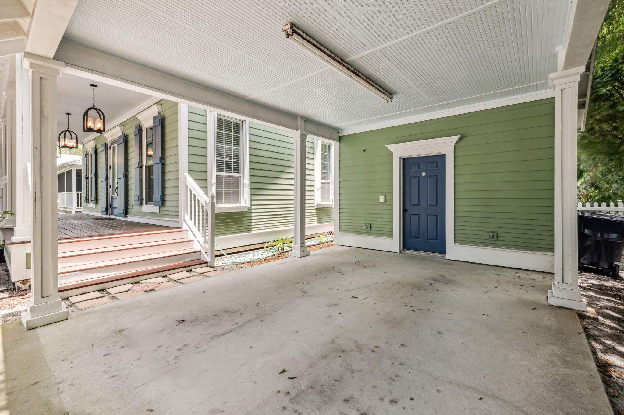 214 Chrysler Avenue Santa Rosa Beach, FL 32459 - Photo 42 of 53 a view of a house with a porch and floor to ceiling window