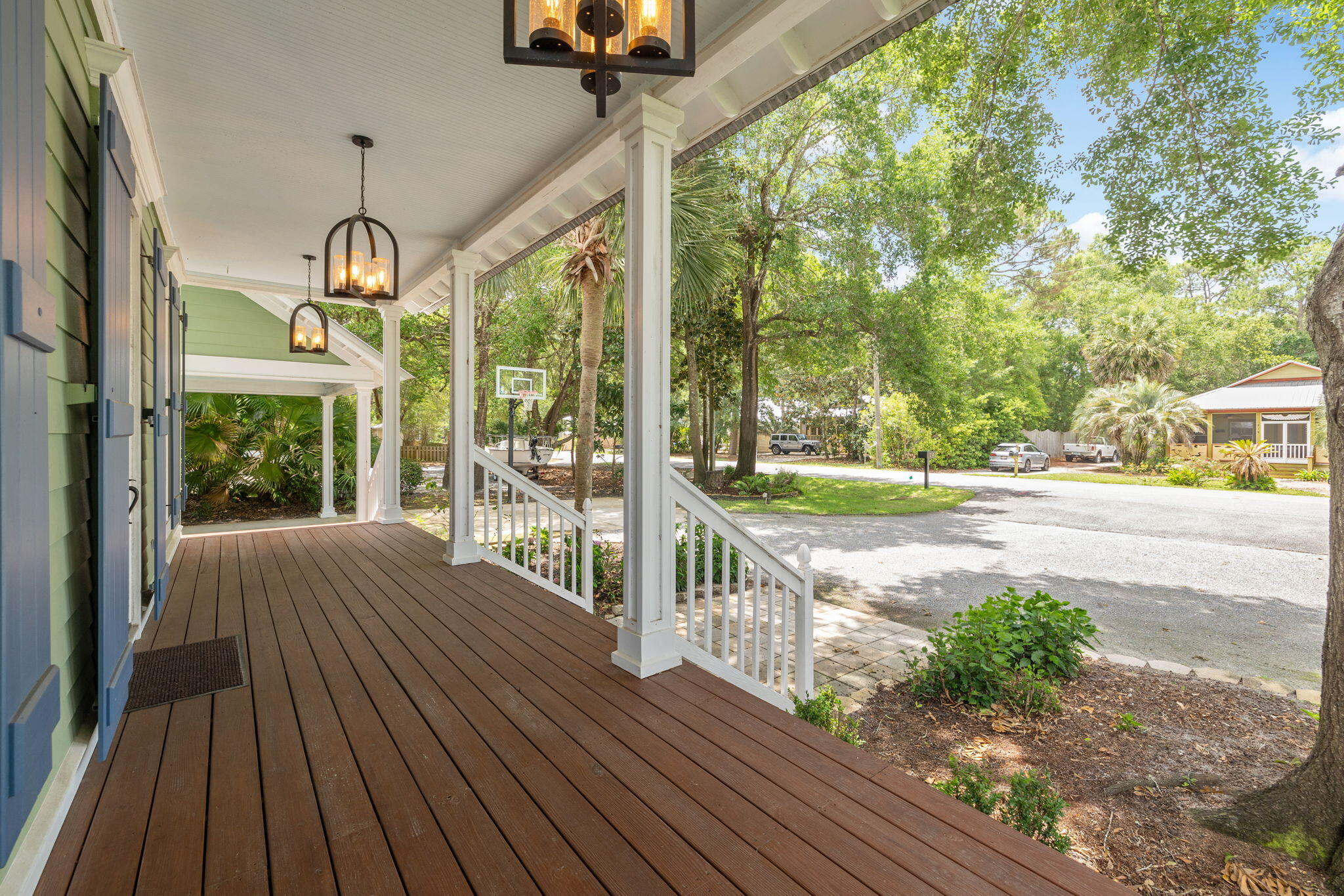 214 Chrysler Avenue Santa Rosa Beach, FL 32459 - Photo 6 of 53 a view of a porch with wooden floor