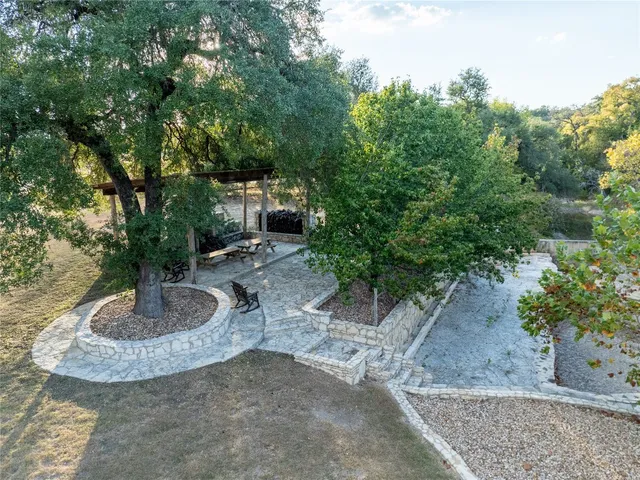 a view of a water fountain in front of a house