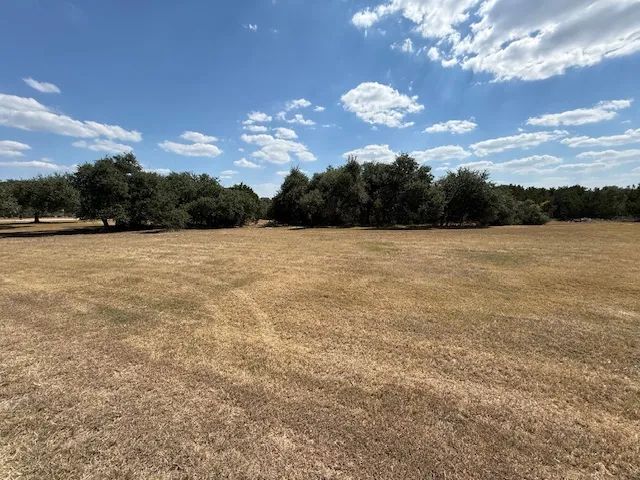a view of an open space and a lake view