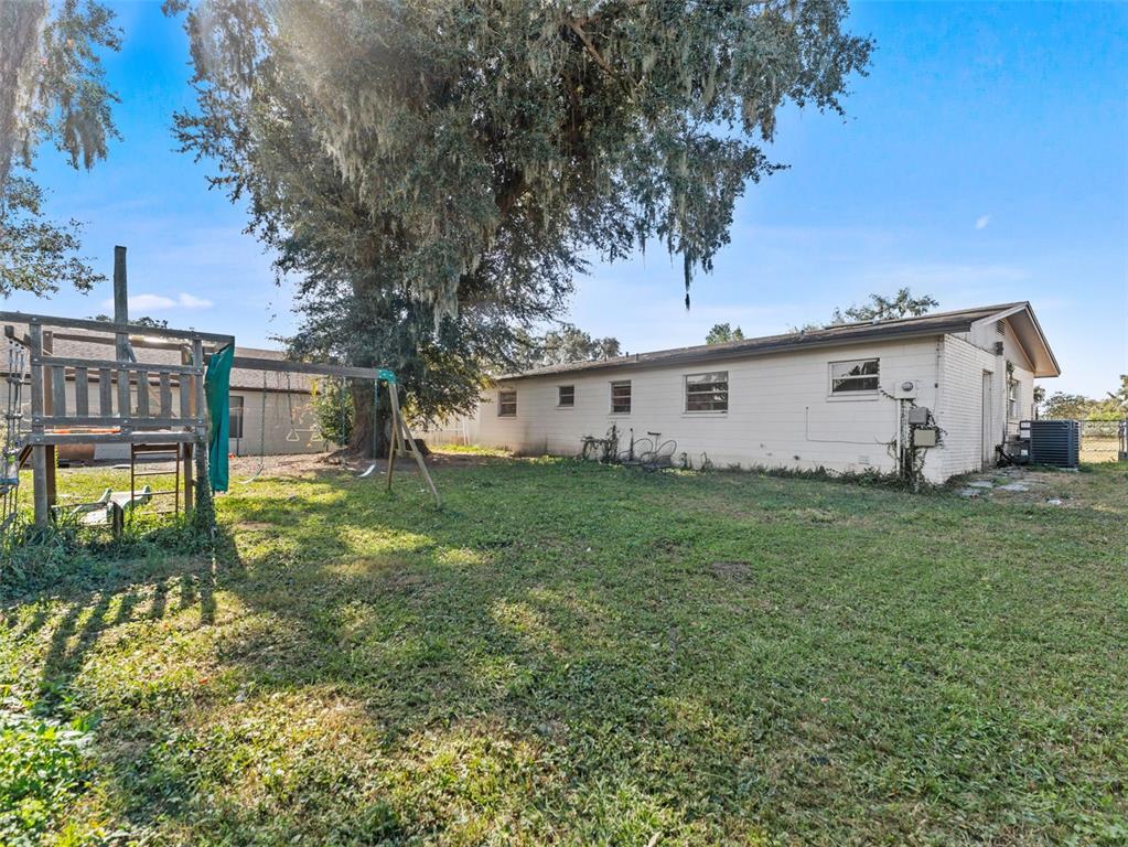 2295 Rohr Drive Bartow, FL 33830 - Photo 22 of 30 a view of a white house with a big yard