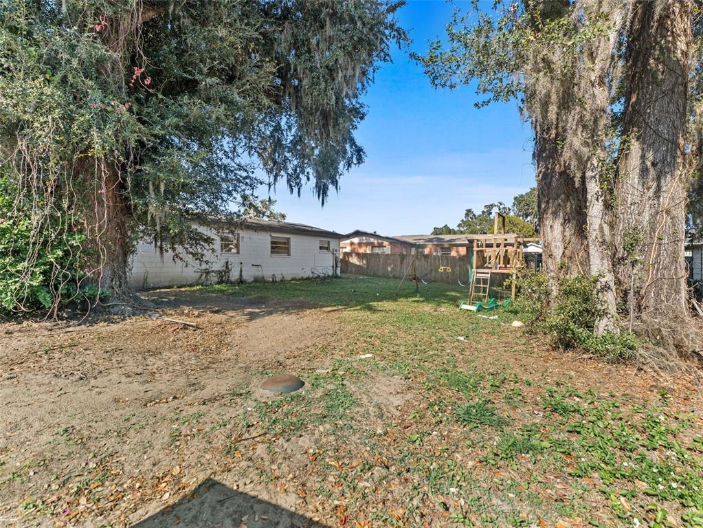 2295 Rohr Drive Bartow, FL 33830 - Photo 23 of 30 a backyard of a house with lots of green space