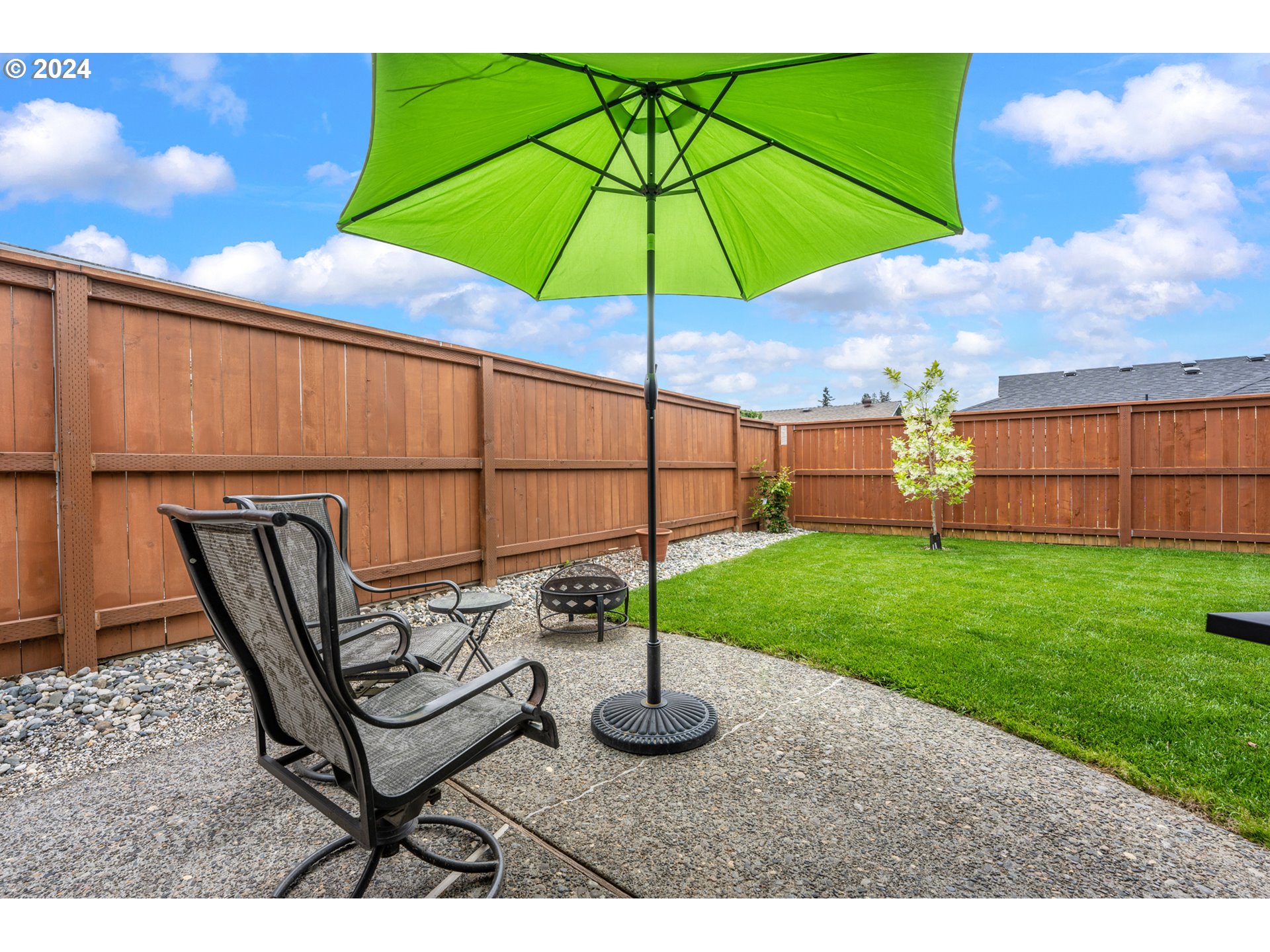 16540 Southwest Queen Mary Avenue Portland, OR 97224 - Photo 24 of 30 a view of a backyard with wooden fence