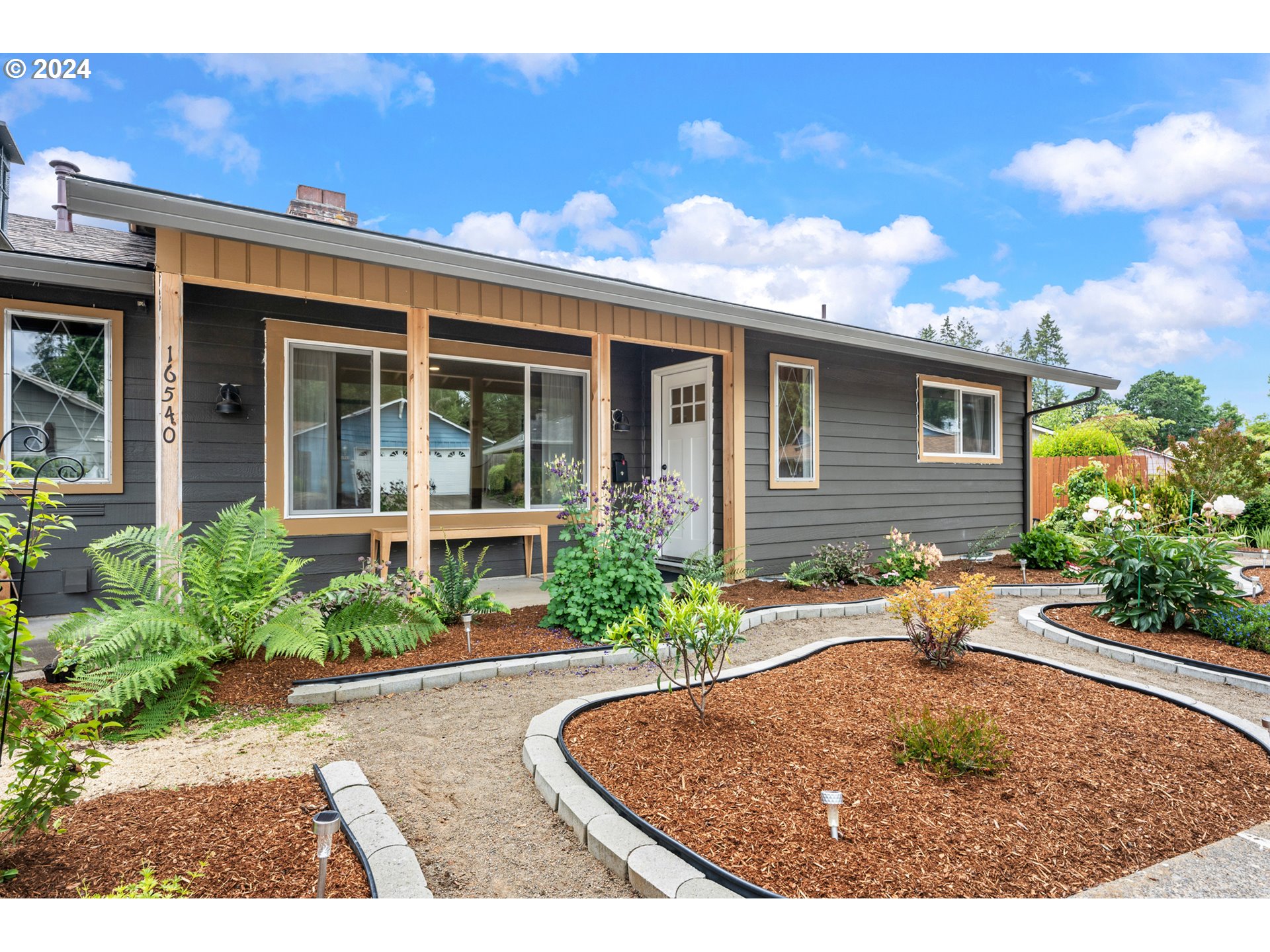 16540 Southwest Queen Mary Avenue Portland, OR 97224 - Photo 5 of 30 front view of a house with a yard