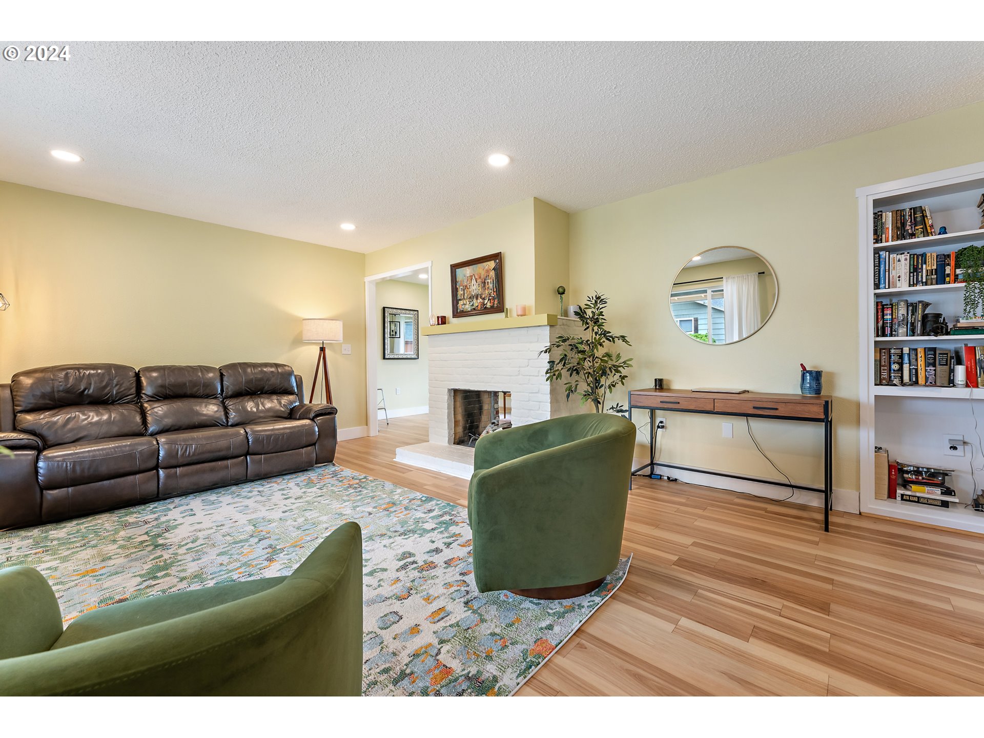 16540 Southwest Queen Mary Avenue Portland, OR 97224 - Photo 6 of 30 a living room with furniture and a wooden floor