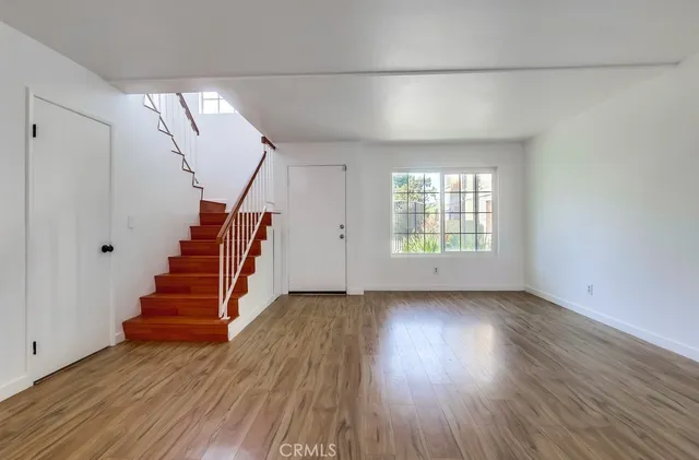 a view of entryway with wooden floor