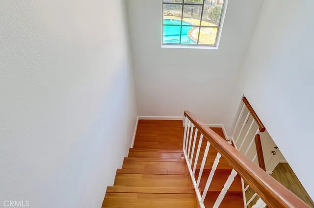 a view of entryway with wooden floor
