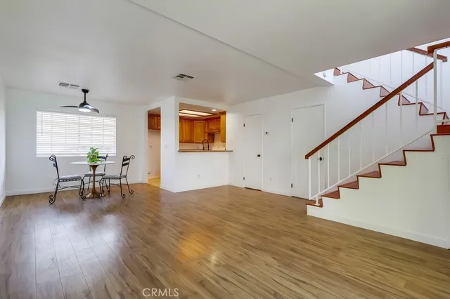 a workspace with furniture and wooden floor