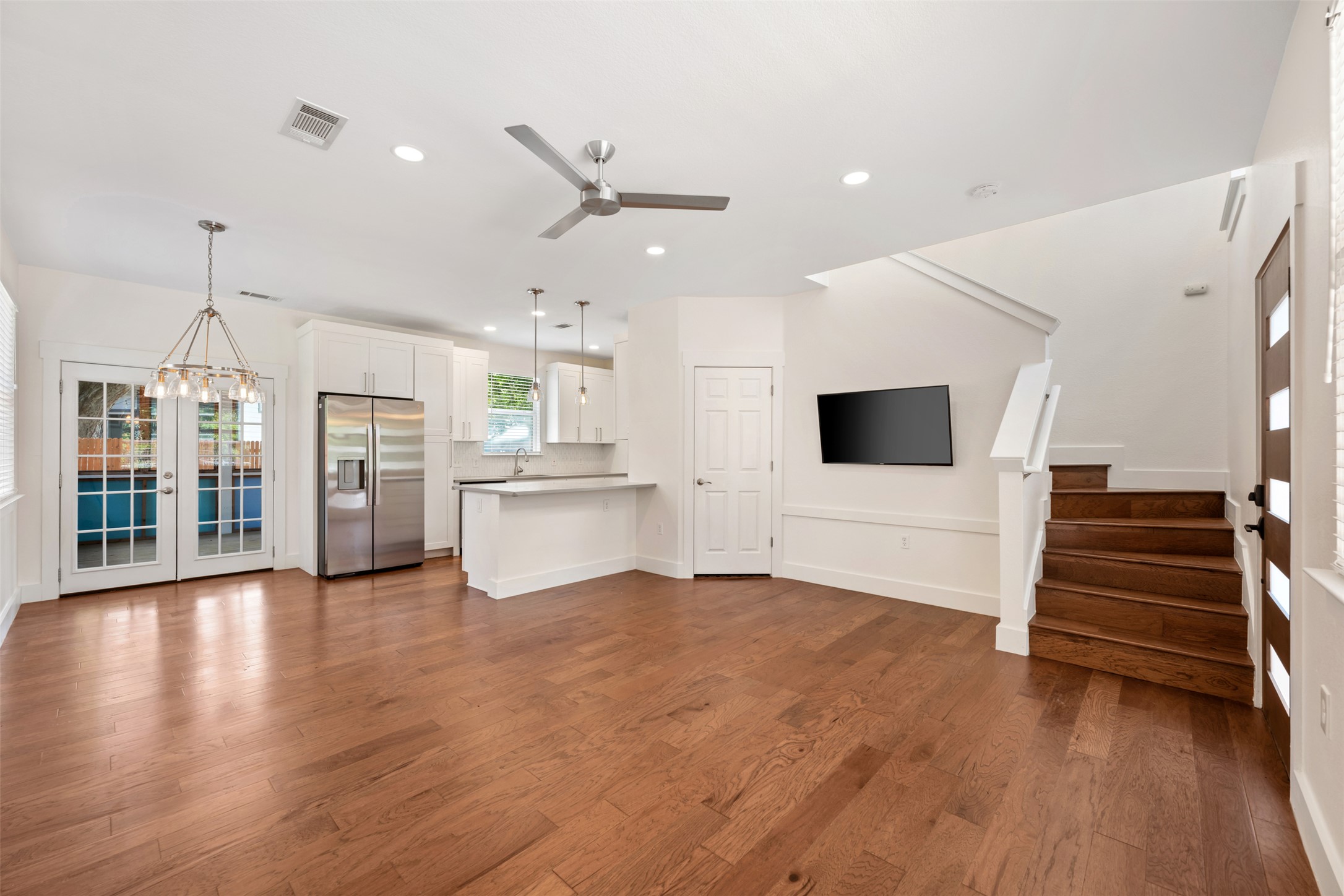 4912 Sara Drive, Unit A Austin, TX 78721 - Photo 5 of 28 Open living, dining, and kitchen, perfect for everyday living and entertaining.