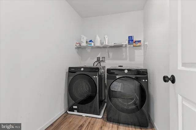 a utility room with dryer and washer