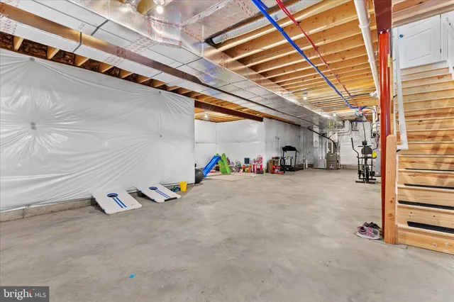 a view of the room with shelves