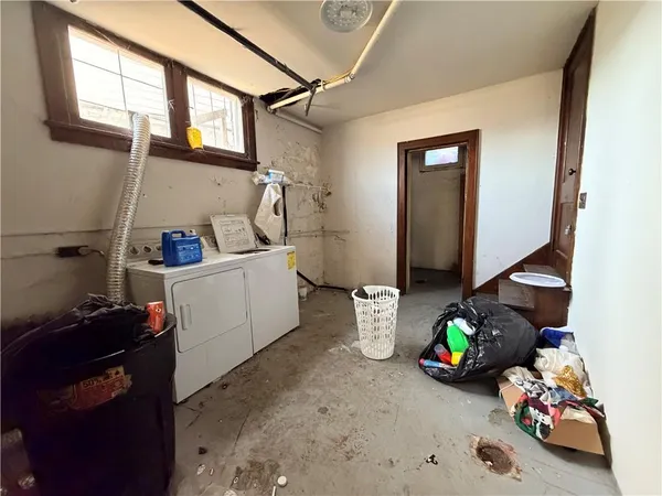 a bathroom with a sink and a window